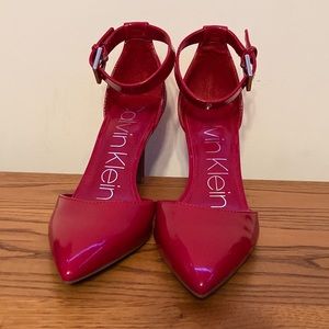 Red Calvin Klein pumps